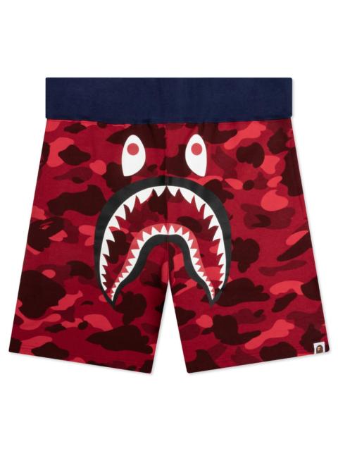 A BATHING APE® CRAZY CAMO SHARK SWEAT SHORTS - RED