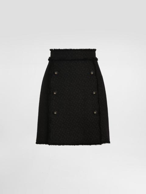 Dolce & Gabbana Short raschel tweed skirt with decorative DG logo buttons