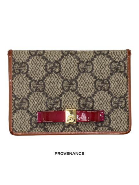 GUCCI Gucci GG Supreme Bow Pocket Organizer Wallet - Hot Orange