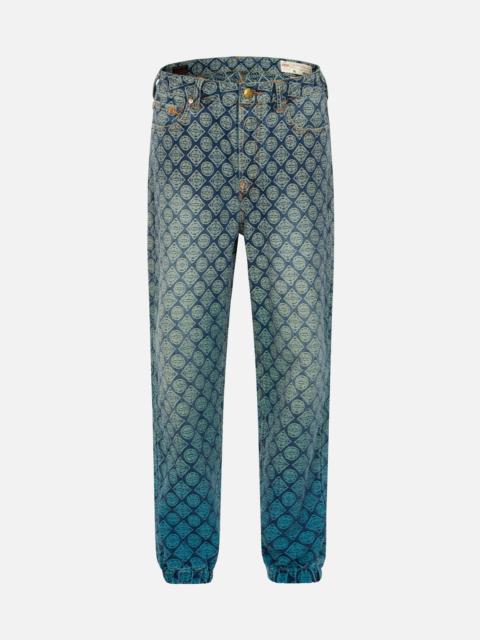 EVISU ALLOVER KAMON JACQUARD RELAX FIT DENIM JOGGERS