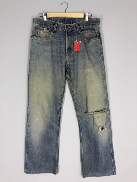 Other Designers Vintage - Vintage Levi's 527 Light Blue Ripped Jean Size 32