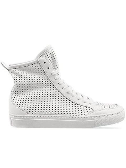 Maison Margiela Perforated sneakers.Like Hermes or Saint Laurent