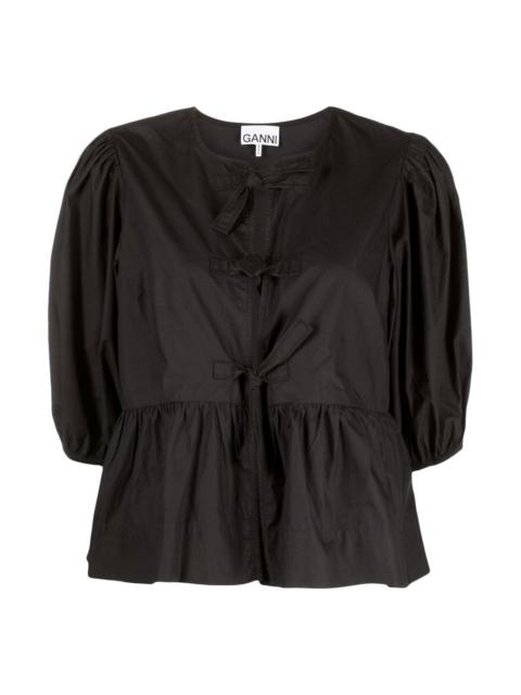 GANNI Cotton peplum top