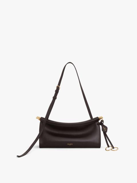 Alaïa LE CLICK EAST WEST SMALL BAG IN LEATHER
