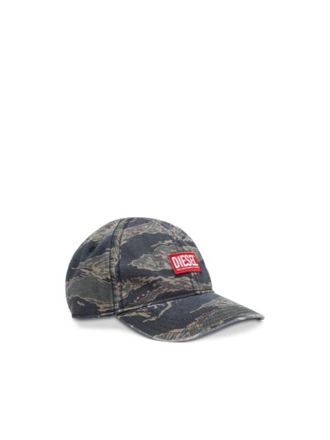 camouflage-print baseball cap