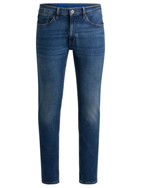 HUGO EXTRA-SLIM-FIT JEANS IN NAVY STONEWASHED STRETCH DENIM