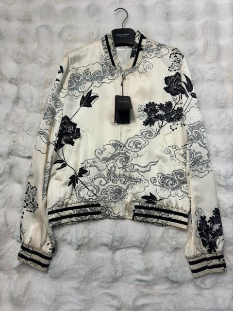SAINT LAURENT Saint Laurent (YSL) runway-edition bomber jacket featuring auspicious cloud and floral motifs.
