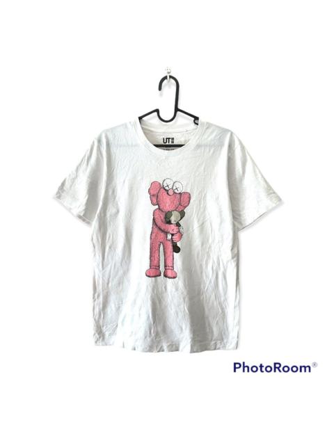 Other Designers kaws x uniqlo big print tshirt xs