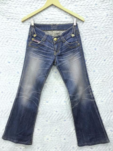 C. BURBERRY BLUE LABEL FLARED DENIM