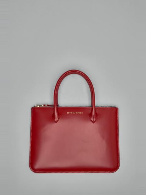 Comme Des Garçons Handles