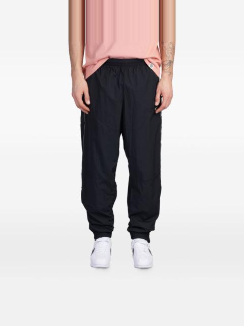 Solo Swoosh track pants