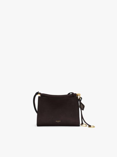 Alaïa LE CLICK SMALL SQUARE BAG IN NUBUCK