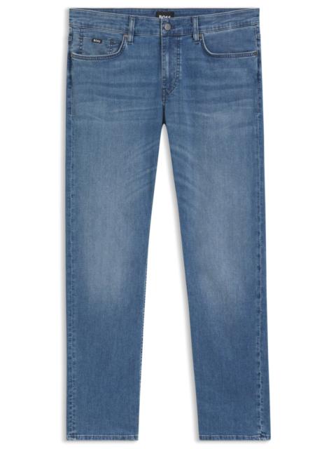 BOSS SLIM-FIT JEANS IN BLUE PERFORMANCE DENIM