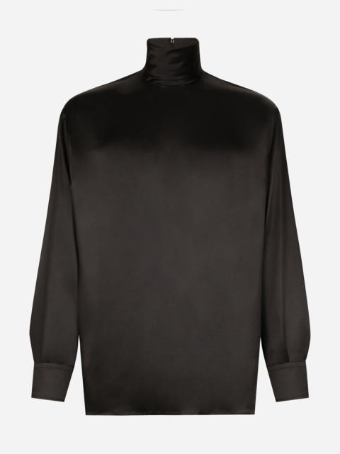 Loose silk turtleneck with shirt cuffs