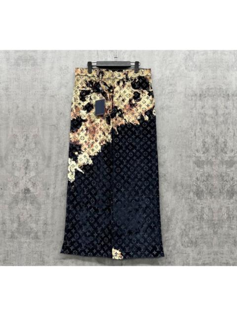 Louis Vuitton Louis Vuitton jeans with full logo and a fiery cloud design.