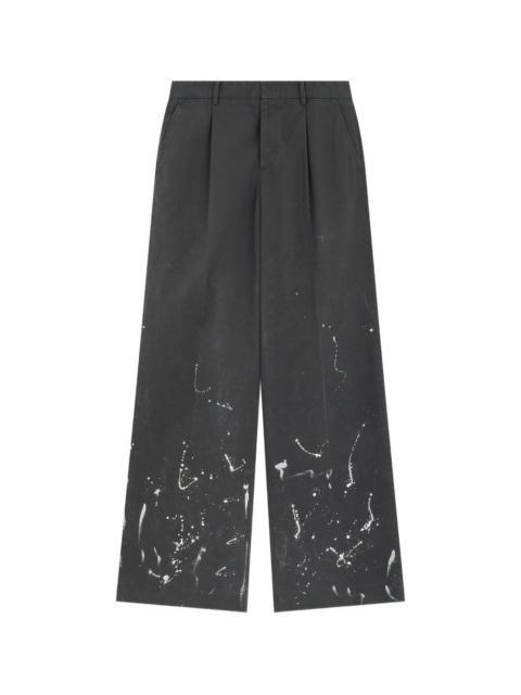 We11done PLEATED PAINT-SPLATTER TROUSERS