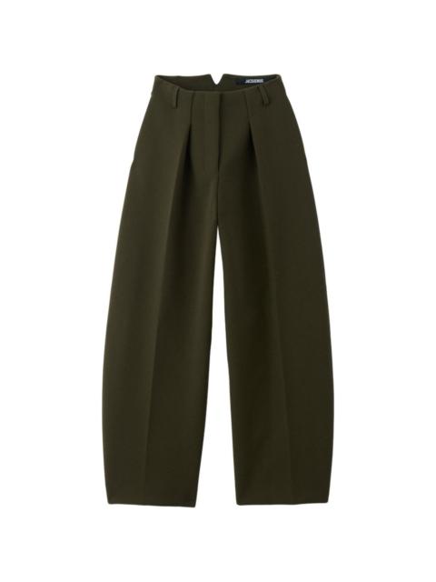 JACQUEMUS Ovalo pleated trousers