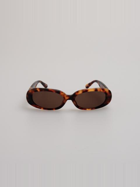LINDA FARROW CARA OVAL SUNGLASSES IN TORTOISESHELL