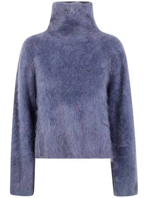 LISA YANG Introducing the 'FLOREN' TURTLENECK SWEATER, a luxurious piece from LISA YANG, designed for the mode