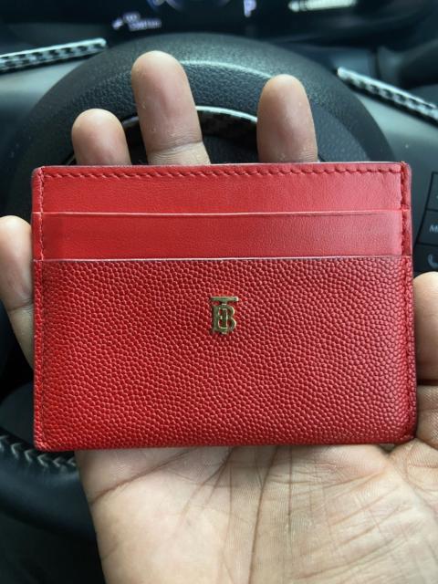 Burberry Burberry leather card case with a gold 'TB' monogram