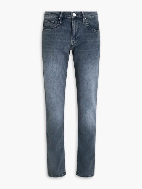 FRAME L'Homme slim-fit faded denim jeans