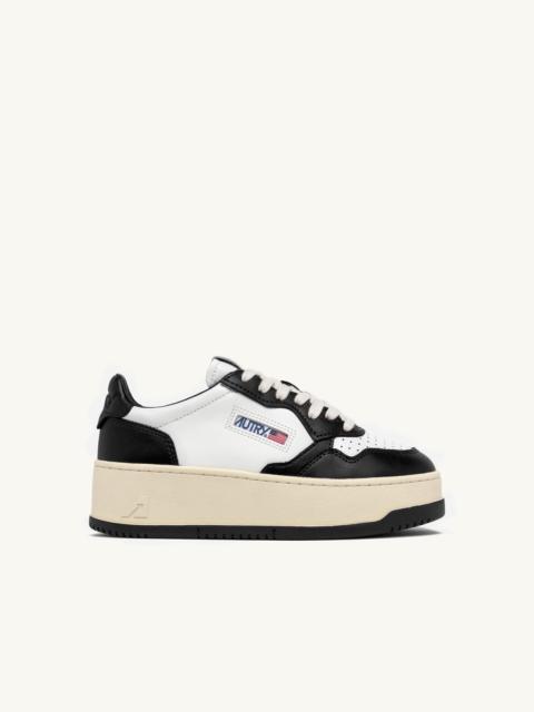 AUTRY MEDALIST PLATFORM SNEAKERS IN WHITE AND BLACK LEATHER