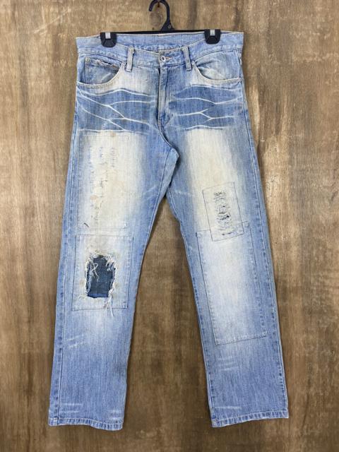 Other Designers Distressed Denim - Monogram Blue Distressed Patchwork Denim Pants #1068