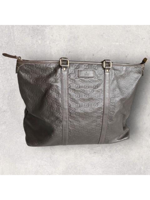 GUCCI Gucci Brown Monogram Embossed Bag