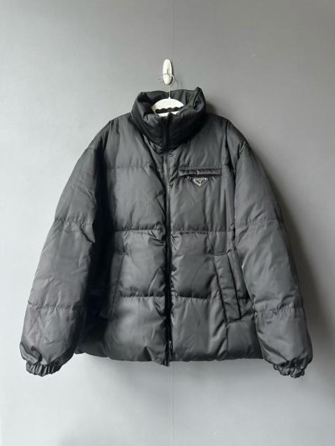 Prada Prada black reversible down jacket with triangular logo.