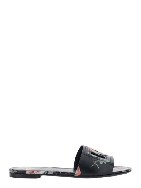 Dolce & Gabbana Dolce & Gabbana Women Black Slide Sandals With Cut Out Logo And Floral Motif In Leather Woman