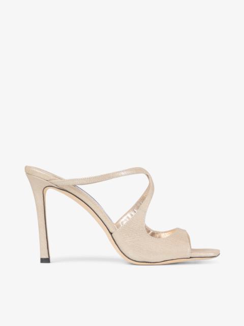 JIMMY CHOO Anise 95
Gold Metallic Leather Mules