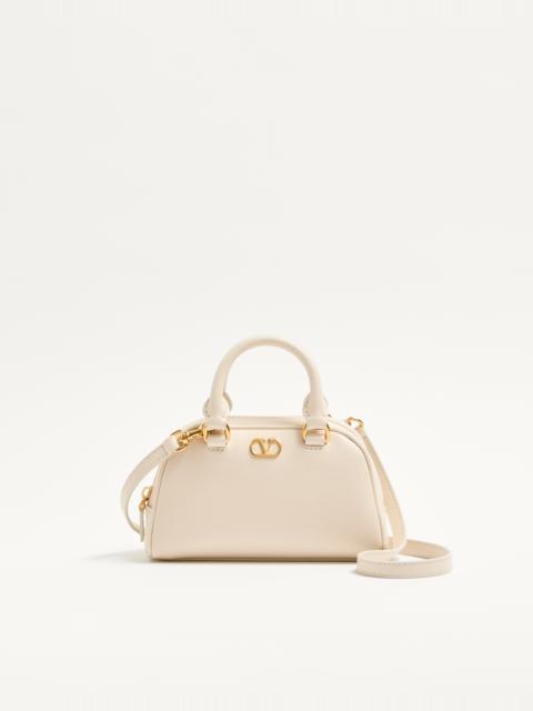 Valentino VLOGO SIGNATURE MINI BOWLING BAG IN GRAINY CALFSKIN