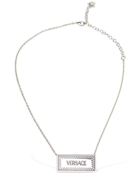 Metal necklace logo plaque