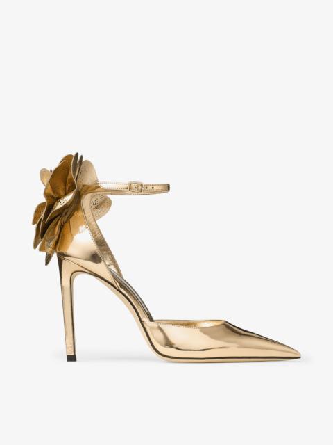 JIMMY CHOO Marja 100
Gold Liquid Metal Leather Sandals with Metal Leather Lace Corsage