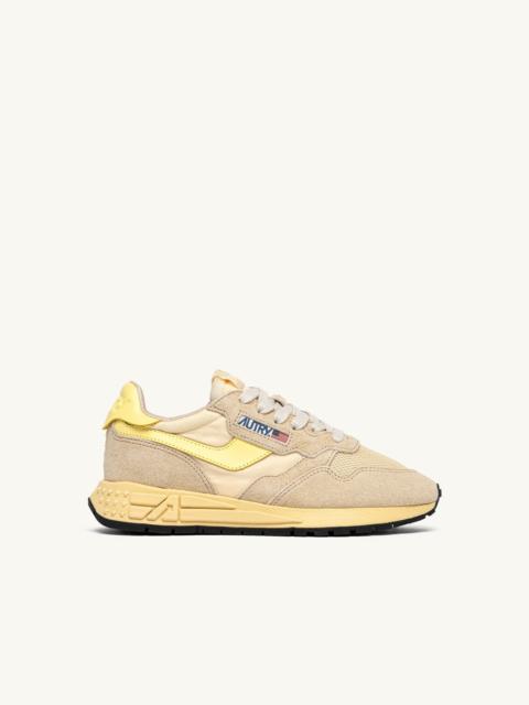 AUTRY REELWIND LOW SNEAKERS IN ECRU AND LEMON MERINGUE NYLON AND SUEDE
