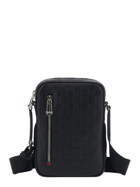 GUCCI Gucci Men 'Emblem' Black Crossbody Bag With Adjustable Shoulder Strap And All-Over Embossed Gg Motif