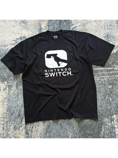 Other Designers Revenge - Nintendo switch 2 tee | Spencer’s GLOCK novelty sleaze