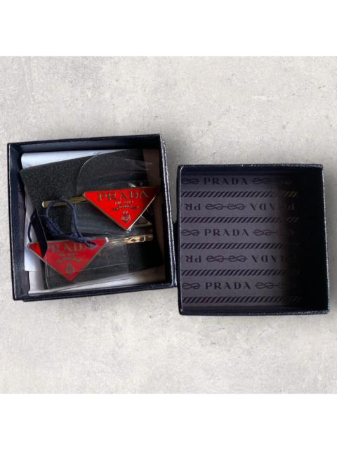 Prada Prada Red triangle hair clips
