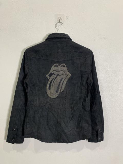 The Rolling stone X in the attic shirt