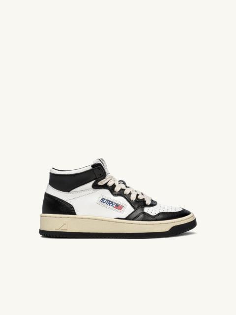 AUTRY MEDALIST MID BICOLOR SNEAKERS IN WHITE AND BLACK LEATHER