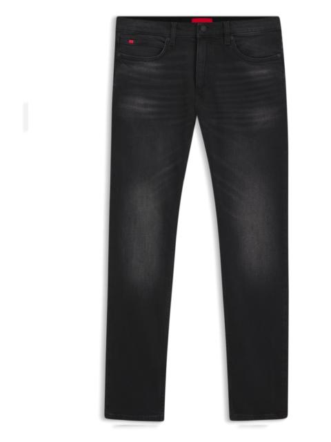 HUGO EXTRA-SLIM-FIT BLACK JEANS IN STRETCH DENIM