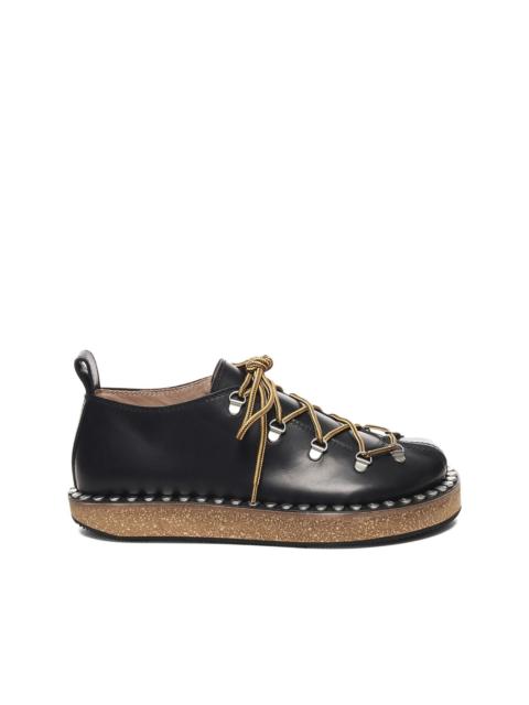 Loewe lace-up studded sneakers