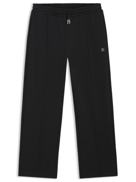 HUGO PINTUCK-PLEAT TRACKSUIT BOTTOMS IN A RELAXED FIT