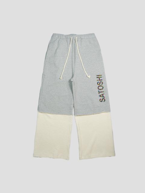SATOSHI NAKAMOTO DOUBLE LAYER STUDDED SWEAT PANTS