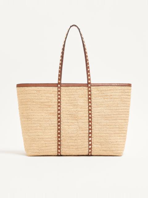 Valentino VALENTINO GARAVANI ROCKSTUD SHOPPING BAG IN RAFFIA