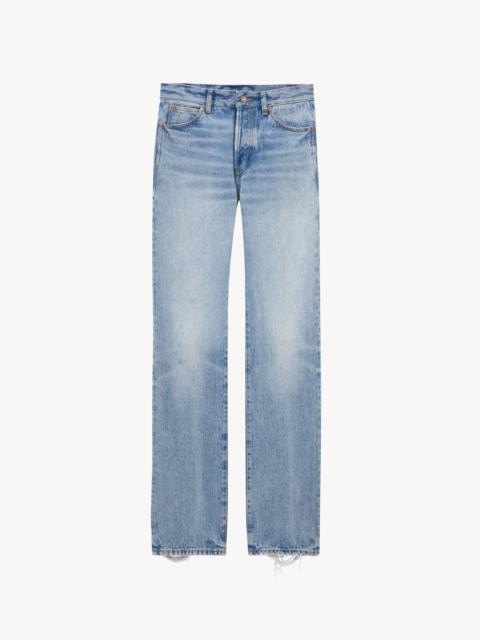 SAINT LAURENT LOW-RISE JEANS IN SICILY BLUE DENIM