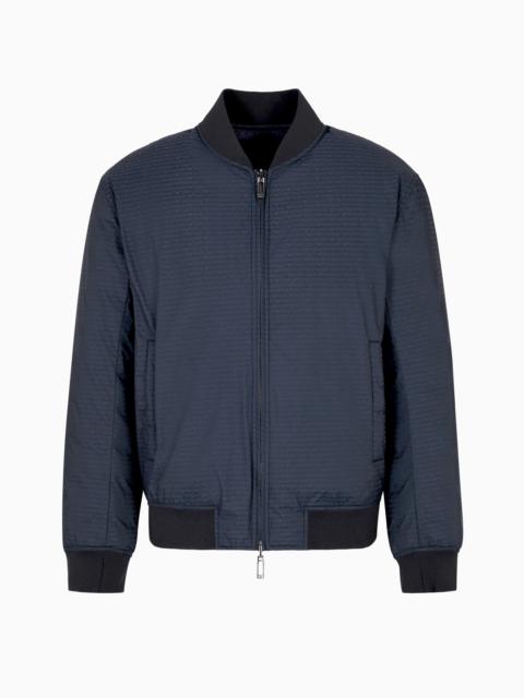 EMPORIO ARMANI REVERSIBLE DOWN JACKET WITH A BOMBER JACKET COLLAR IN JACQUARD NYLON WITH ALL-OVER LETTERING