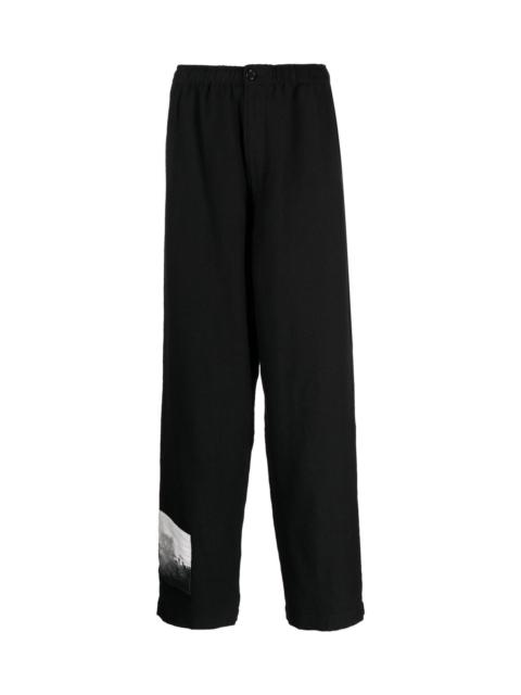 UNDERCOVER GRAPHIC-PATCH WOOL TROUSERS