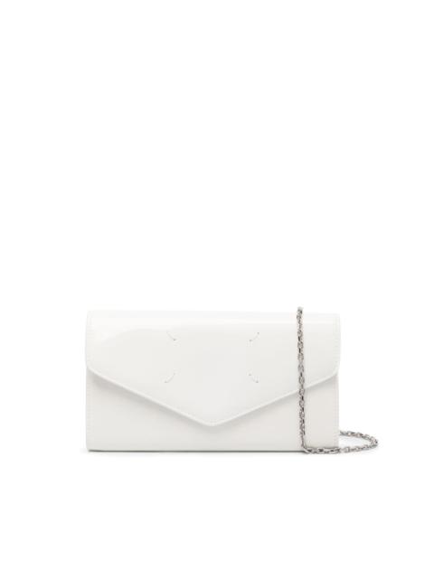 Four-stitch leather clutch bag