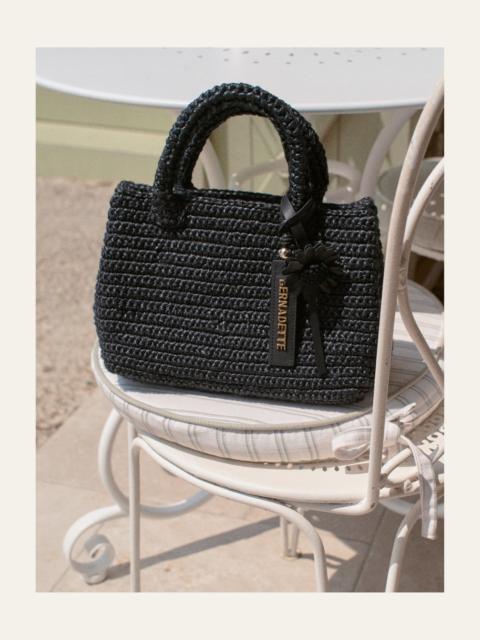 BERNADETTE The Leather Daisy Charm